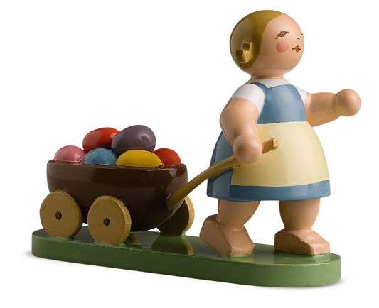 Fille de Pâques avec calèche