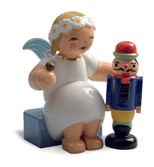 Marguerite angel with nutcracker