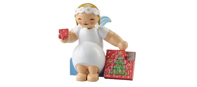 Marguerite angel with puzzle, sitting
